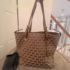 Michael Kors tan and gold purse